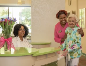 Delmar Gardens of Gwinnett staff and resident. Respite Care Benefits.